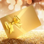 gold gift card with bow on glitter